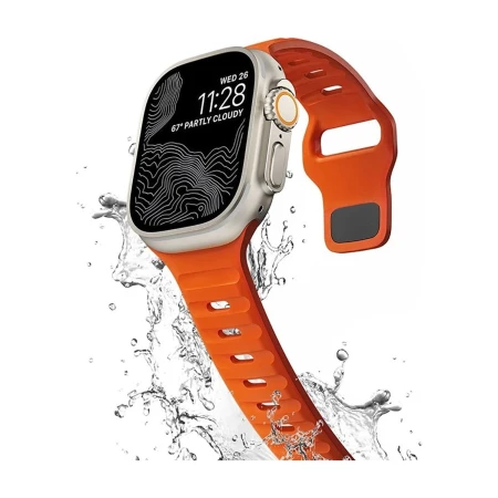 Grafika producenta: pomarańczowy pasek Iconband Line na Apple Watch Ultra z efektem rozprysku wody