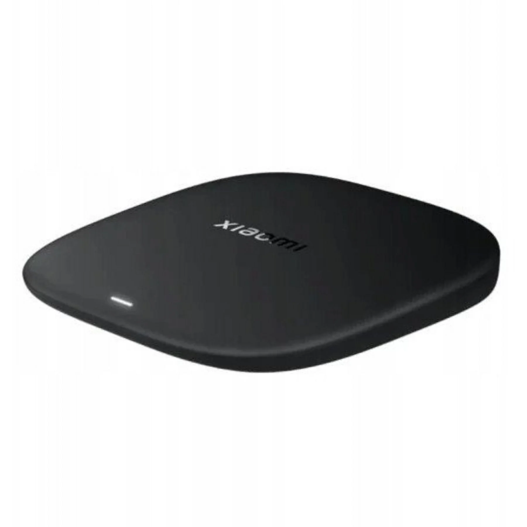 xiaomi tv box s 3. generacja w czarnej obudowie, ujęcie pod kątem z góry na zaokrąglony kształt