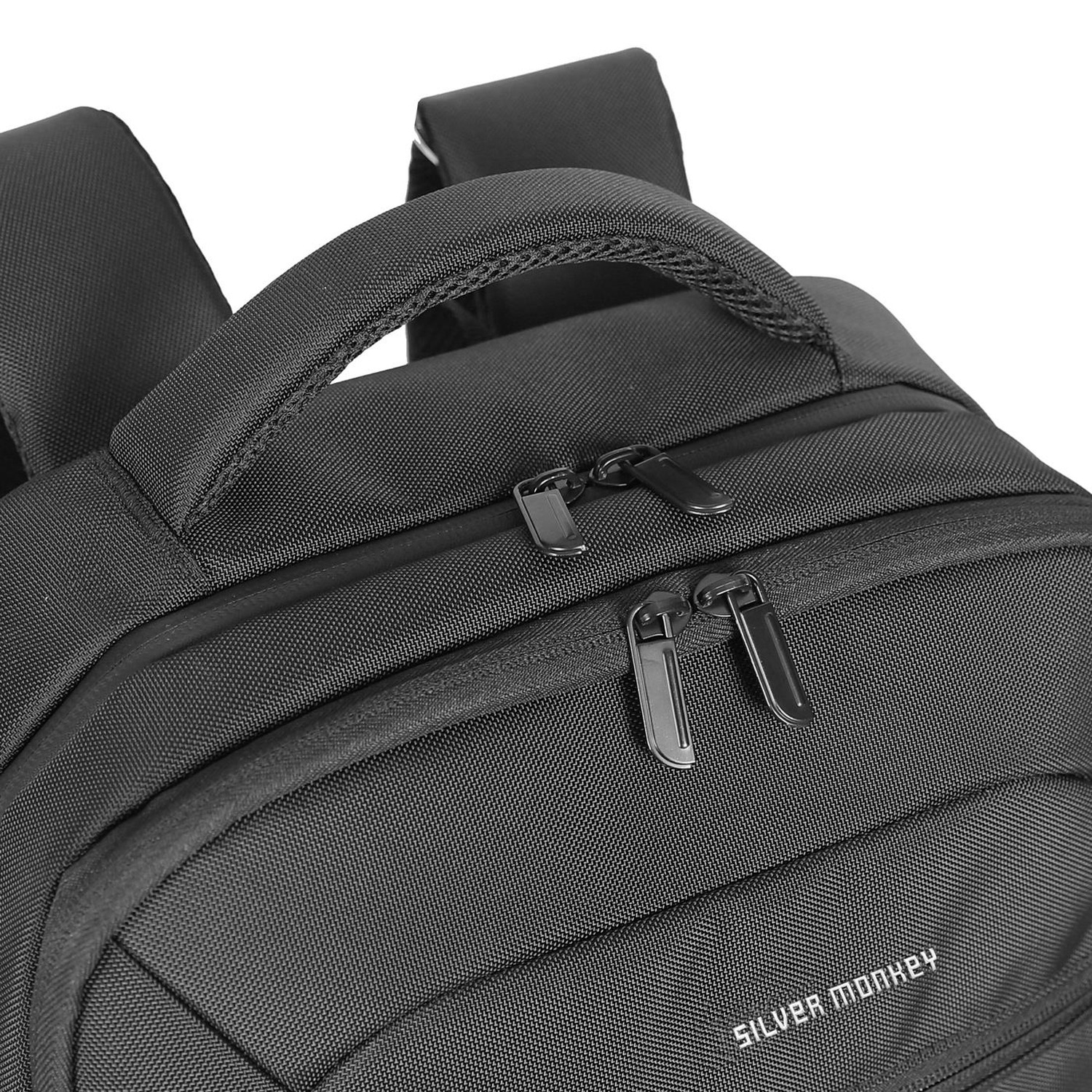 Wzmacniana rączka i podwójne suwaki zamka plecaka Silver Monkey Modern — zbliżenie
