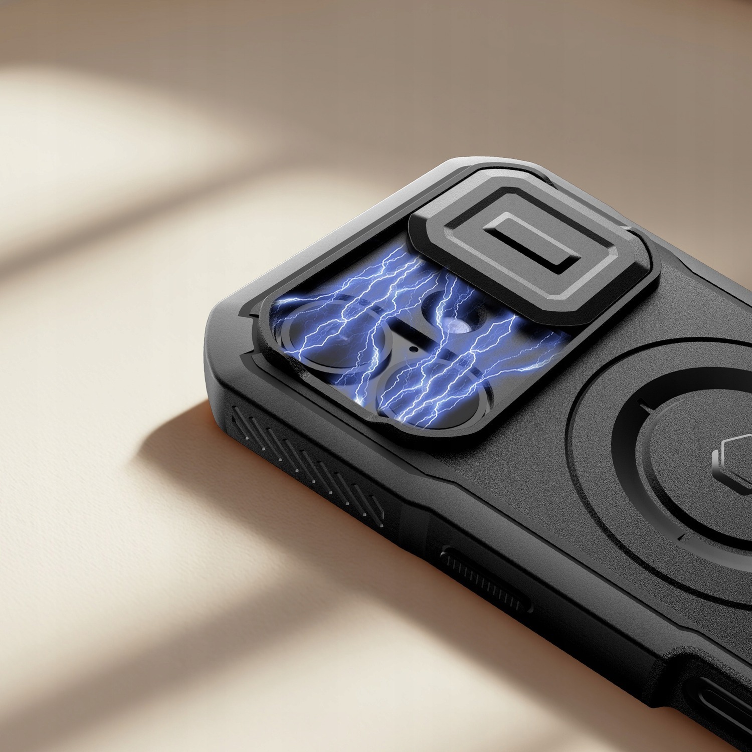 Zbliżenie przesuwanej osłony aparatów w etui Tech-Protect Kevlar do iPhone 17 — osłona częściowo odsunięta