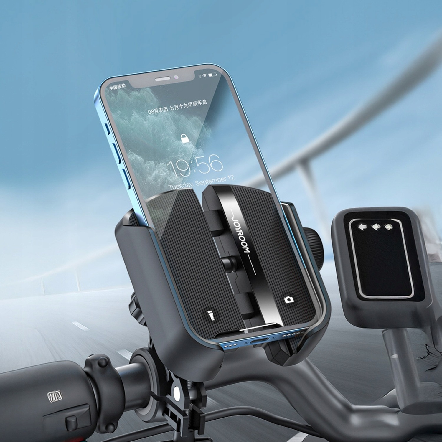 Joyroom JR-ZS431 z telefonem w pionie na kierownicy hulajnogi — nawigacja